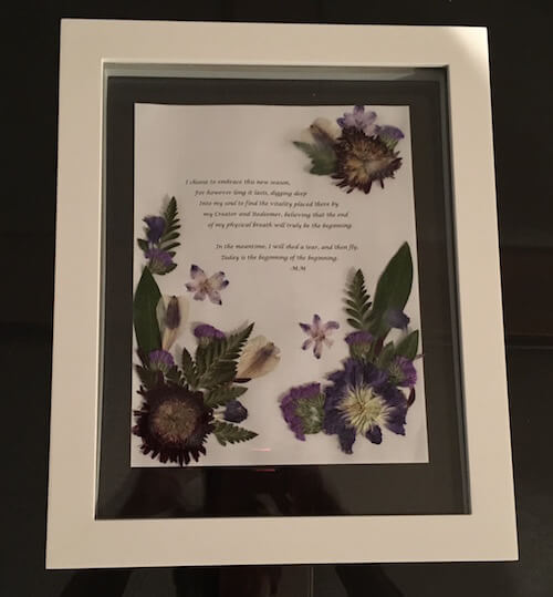 Framed picture of dried flowers and blog quote