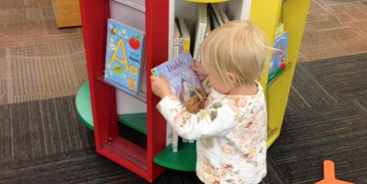 Child in Library with Boardbooks